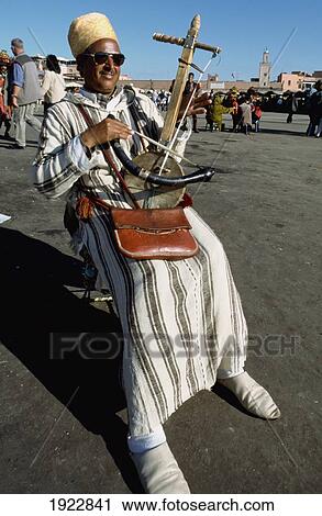 Stock Image - Musician In A Square. Fotosearch