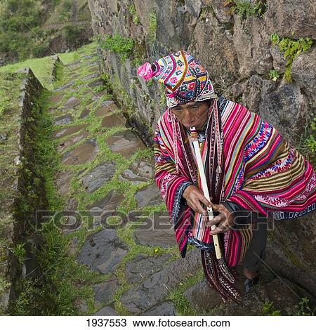 Musician Playing Flute At Archaeological Park Of Pisac; Pisac Peru View Large Photo Image Stock Image - Musician Playing Flute At Archaeological Park Of Pisac; Pisac Peru. Fotosearch