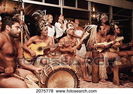 Stock Photo - Musicians Of The Kari Kari Dance Troup Performing Rapa Nui Music At The Hotel Hanga Roa, Rapa Nui (Easter Island), Chile. Fotosearch