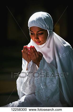 Muslim woman in Brunei mosque; Bandar Seri Begawan, Brunei View Large Photo Image Stock Image - Muslim woman in Brunei mosque; Bandar Seri Begawan, Brunei. Fotosearch