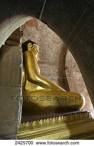 Stock Image - Myanmar (Burma), Bagan, Htilominio Pahto, sitting Buddha. Fotosearch