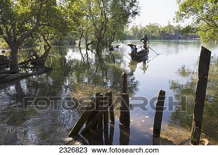 Myanmar (Burma), Irrawaddyi division, Paung Thoe village, Local ferry to cross river View Large Photo Image Stock Image - Myanmar (Burma), Irrawaddyi division, Paung Thoe village, Local ferry to cross river. Fotosearch