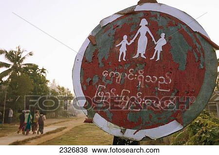 Stock Photo - Myanmar (Burma), Irrawaddyi division, Street sign; Nag Yoke kaung village. Fotosearch