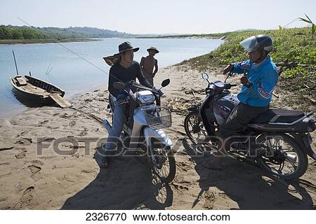 Myanmar (Burma), Motorbike trip from Nyaung San to Yea Thoe village; Irrawaddyi division View Large Photo Image Stock Image - Myanmar (Burma), Motorbike trip from Nyaung San to Yea Thoe village; Irrawaddyi division. Fotosearch