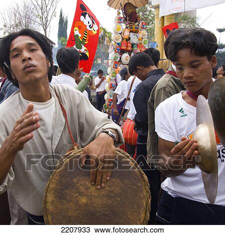 Stock Image - Myanmar (Burma). Southern Shan State. Kalaw. Yearly Festival. This Festival Has Both A Secular And Religious Character. A Huge Procession In The Streets Of Kalaw Ends In The Main Monastery Courtyard. An Opportunity For Offerings To The Monks. Fotosearch