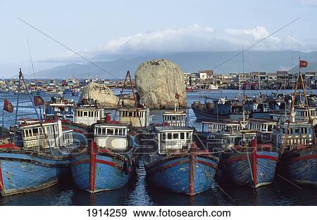 Nah Trang, blue fishing boats, Vietnam View Large Photo Image Stock Photo - Nah Trang, blue fishing boats, Vietnam. Fotosearch