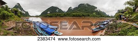 Nam Ou and limestone mountains; Muang Ngoy, Laos View Large Photo Image Picture - Nam Ou and limestone mountains; Muang Ngoy, Laos. Fotosearch