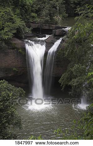 Stock Photo - Namtok Heo Suwat Waterfall, Khao Yai National Park, Thailand; Small Waterfall Flowing Into Stream. Fotosearch