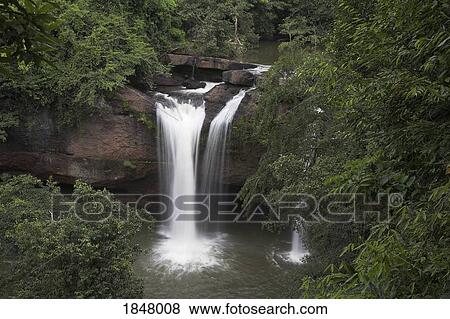 Stock Photo - Namtok Heo Suwat Waterfall, Khao Yai National Park, Thailand; Small Waterfall Flowing Into Stream. Fotosearch