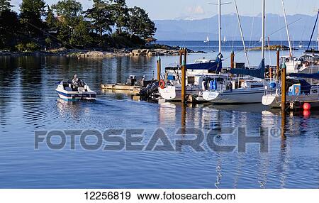 Nanoose Bay marina before sunset; Vancouver Island, British Columbia, Canada View Large Photo Image Stock Photo - Nanoose Bay marina before sunset; Vancouver Island, British Columbia, Canada. Fotosearch