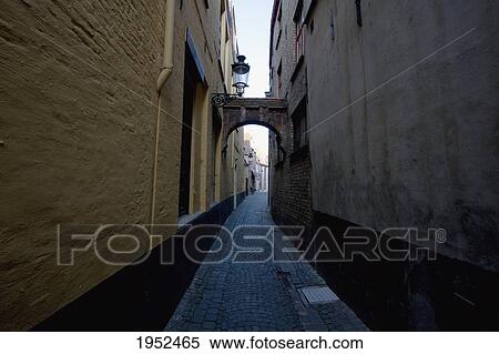 Narrow alley, Bruges (Brugge), West Flanders, Belgium View Large Photo Image Stock Photography - Narrow alley, Bruges (Brugge), West Flanders, Belgium. Fotosearch