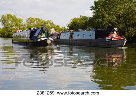 Stock Photo - Narrowboats on Gloucester and Sharpness canal; Gloucester, England. Fotosearch