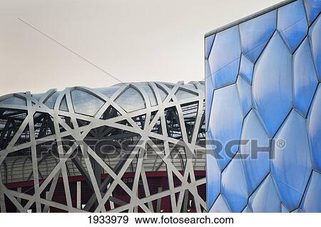 Stock Photo - National Aquatics Center And The Bird's Nest Stadium Built For 2008 Summer Olympics; Beijing, China. Fotosearch
