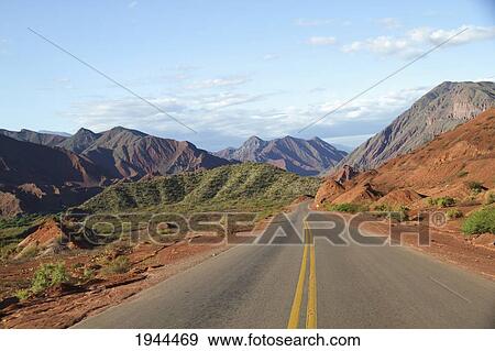 Stock Photo - National Route 68 and colorful rock formations in Quebrada de las Conchas, Valles Calchaquies, Salta, Argentina. Fotosearch