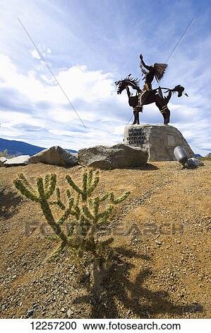 Stock Image - Native American statue in Nk'Mip Desert Culture Centre; Osoyoos, British Columbia, Canada. Fotosearch