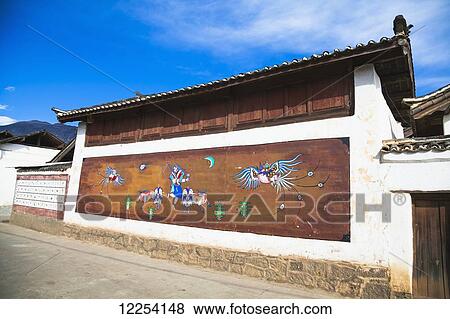 Naxi and Yi traditional pictographs on village wall; Lijiang, Yunnan Province, China View Large Photo Image Stock Photo - Naxi and Yi traditional pictographs on village wall; Lijiang, Yunnan Province, China. Fotosearch