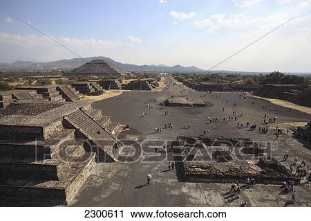 Stock Image - Near Mexico City; Mexico, Teotihuacan Archeological Site, View From Top Of Pyramid Of The Moon Along Avenue Of The Dead. Fotosearch