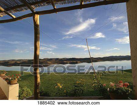 Stock Image - Near Ouarzazate; Morocco, View From Terrace Towards Desert Oasis In The Dades Valley. Fotosearch