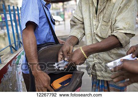 Stock Image - Needle exchange; Dhaka, Bangladesh. Fotosearch