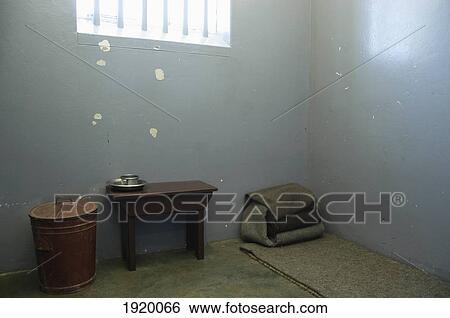Stock Photograph - Nelson Mandela's Cell In Prison; Robben Island, Cape Town, South Africa. Fotosearch