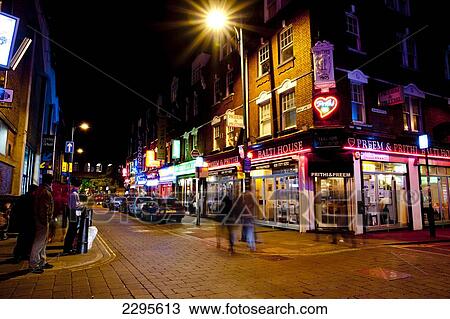 Stock Image - Neon Lights From The Indian Restaurants In Brick Lane, East London, London, Uk. Fotosearch