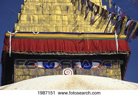 Nepal, Close-up of painted eyes on Boudhanath Stupa and colorful streaming flags; Kathmandu View Large Photo Image Stock Image - Nepal, Close-up of painted eyes on Boudhanath Stupa and colorful streaming flags; Kathmandu. Fotosearch