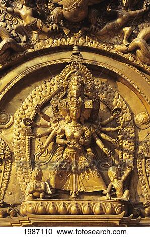 Nepal, Durbar Square; Bhaktapur, Golden Gate, Detail of figure in carving with many heads and arms View Large Photo Image Stock Image - Nepal, Durbar Square; Bhaktapur, Golden Gate, Detail of figure in carving with many heads and arms. Fotosearch