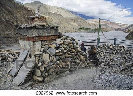 Nepal, Upper Mustang, Kali Gandaki gorge, People sitting next to chorten; Kagben View Large Photo Image Stock Image - Nepal, Upper Mustang, Kali Gandaki gorge, People sitting next to chorten; Kagben. Fotosearch