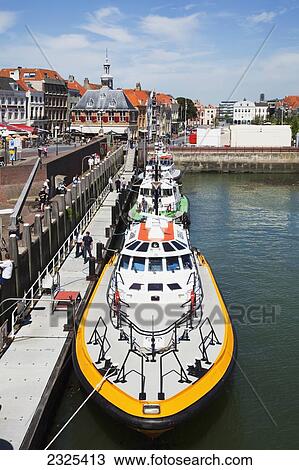 Stock Image - Netherlands, Zealand, Boats docked in harbour; Vlissingen. Fotosearch