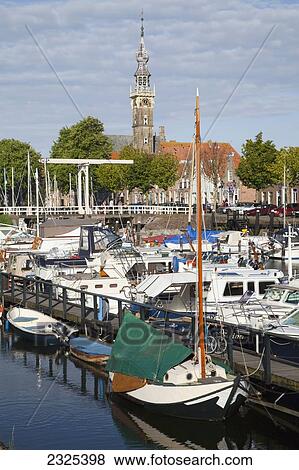 Stock Photo - Netherlands, Zealand, Boats in harbour; Veere. Fotosearch