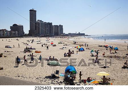 Stock Image - Netherlands, Zealand, Town and busy beach; Vlissingen. Fotosearch