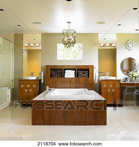 Neutral Modern Bathroom Featuring Bathtub With Wood Surround; Victoria Vancouver Island British Columbia Canada View Large Photo Image Picture - Neutral Modern Bathroom Featuring Bathtub With Wood Surround; Victoria Vancouver Island British Columbia Canada. Fotosearch