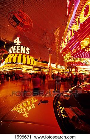 Stock Image - Nevada, Las Vegas, Fremont Casino, Neon Lights Reflects On A Car On Display On Fremont Street. Fotosearch