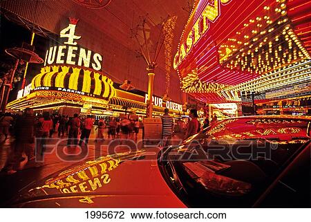 Stock Image - Nevada, Las Vegas, Fremont Casino, Neon Lights Reflects On A Car On Display On Fremont Street. Fotosearch