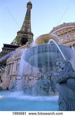 Nevada, Las Vegas, Paris Hotel And Casino, Eiffel Tower Replica Rises Above A Facade Of French Buildings And Fountains View Large Photo Image Stock Image - Nevada, Las Vegas, Paris Hotel And Casino, Eiffel Tower Replica Rises Above A Facade Of French Buildings And Fountains. Fotosearch