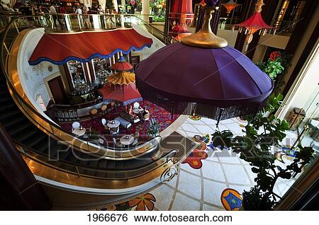 Stock Photograph - Nevada, Las Vegas, Wynn Las Vegas Hotel, Overlooking Escalator And Lobby Near Spa Entrance. Editorial Use Only.. Fotosearch