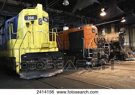 Stock Photograph - Nevada Northern Railway three old engines in round house; Ely, Nevada, United States of America. Fotosearch