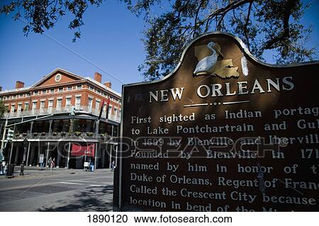 Stock Image - New Orleans Historical Information Sign Outside French Colonial Building. Fotosearch
