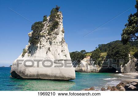 New Zealand, North Island, Coromandel, Cathedral Cove, Sandstone Island Known Has 'te Hoho'. View Large Photo Image Stock Image - New Zealand, North Island, Coromandel, Cathedral Cove, Sandstone Island Known Has 'te Hoho'.. Fotosearch