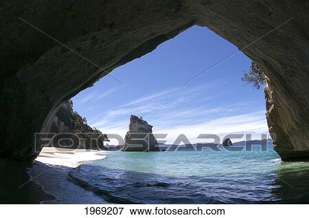 New Zealand, North Island, Coromandel, Cathedral Cove, Sandstone Island Known Has 'te Hoho'. View Large Photo Image Stock Photo - New Zealand, North Island, Coromandel, Cathedral Cove, Sandstone Island Known Has 'te Hoho'.. Fotosearch