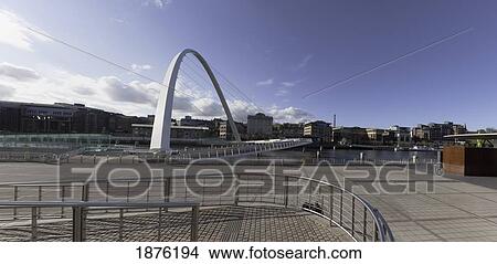 Picture - Newcastle, Northumberland, England; A White Arch On A Bridge Over A River. Fotosearch