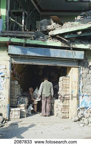 Newspaper Store In A Bazaar Damaged By The 8 October 2005 Earthquake, Muzaffarabad, Azad Kashmir, Pakistan View Large Photo Image Stock Image - Newspaper Store In A Bazaar Damaged By The 8 October 2005 Earthquake, Muzaffarabad, Azad Kashmir, Pakistan. Fotosearch