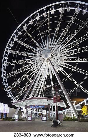 Stock Image - Niagara Skywheel Ferris Wheel At Night; Niagara Falls Ontario Canada. Fotosearch