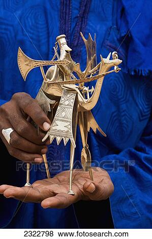 Stock Photo - Niger, Northern Niger, Air Region, Contemporary silver craft jewelry in traditional Tuareg style; Agadez. Fotosearch