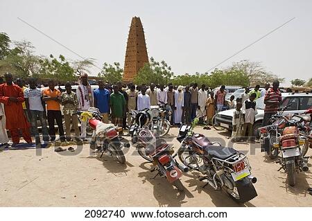 Stock Image - Niger, Sahara Desert, Agadez Region, Friday prayers by Agadez Grand Mosque; Agadez. Fotosearch