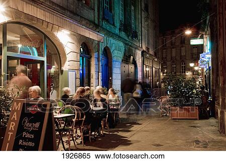 Stock Photography - Nigh Shot Of Restaurant At Rue St. Remi. Fotosearch