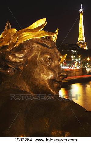 Night Lights Of The Eiffel Tower And The River Seine As Seen From The Pont Alexandre Ii; Paris France View Large Photo Image Picture - Night Lights Of The Eiffel Tower And The River Seine As Seen From The Pont Alexandre Ii; Paris France. Fotosearch