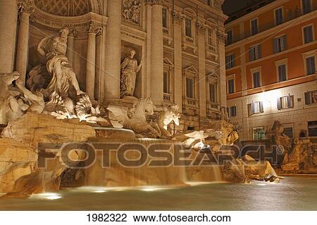 Stock Image - Night Lights Of The Trevi Fountain; Rome Lazio Italy. Fotosearch