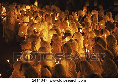 Stock Photo - Night parade of the tabot (replica of the Ark of the Covenant) around the city; Axum, Tigray region, Ethiopia. Fotosearch