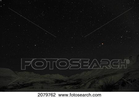 Night Skies Over The Tombstone Mountains In Tombstone Territorial Park, Yukon. View Large Photo Image Stock Image - Night Skies Over The Tombstone Mountains In Tombstone Territorial Park, Yukon.. Fotosearch